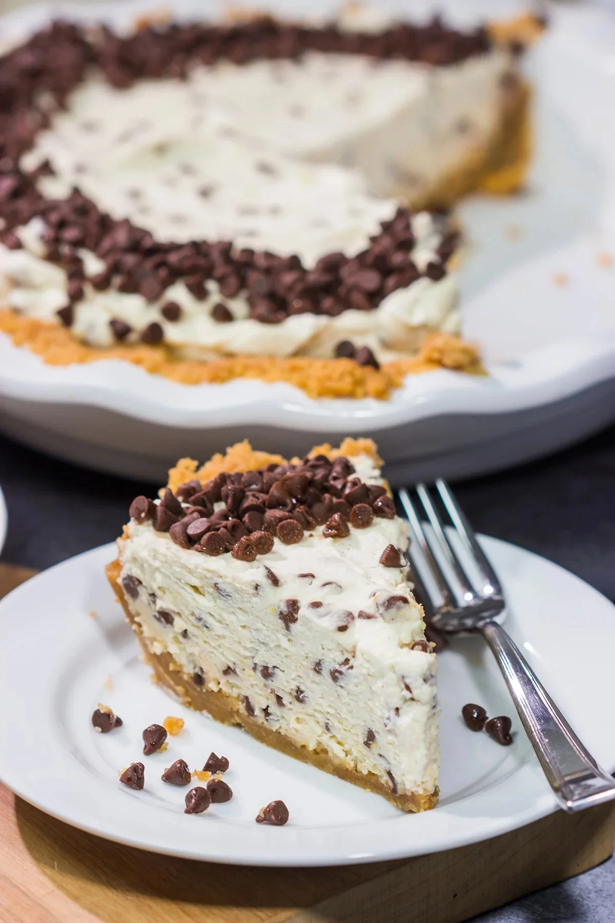 Delicious Chocolate Chip Cannoli Pie topped with chocolate chips and a creamy filling.