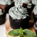 Mint chocolate cupcakes decorated with mint frosting and chocolate sprinkles