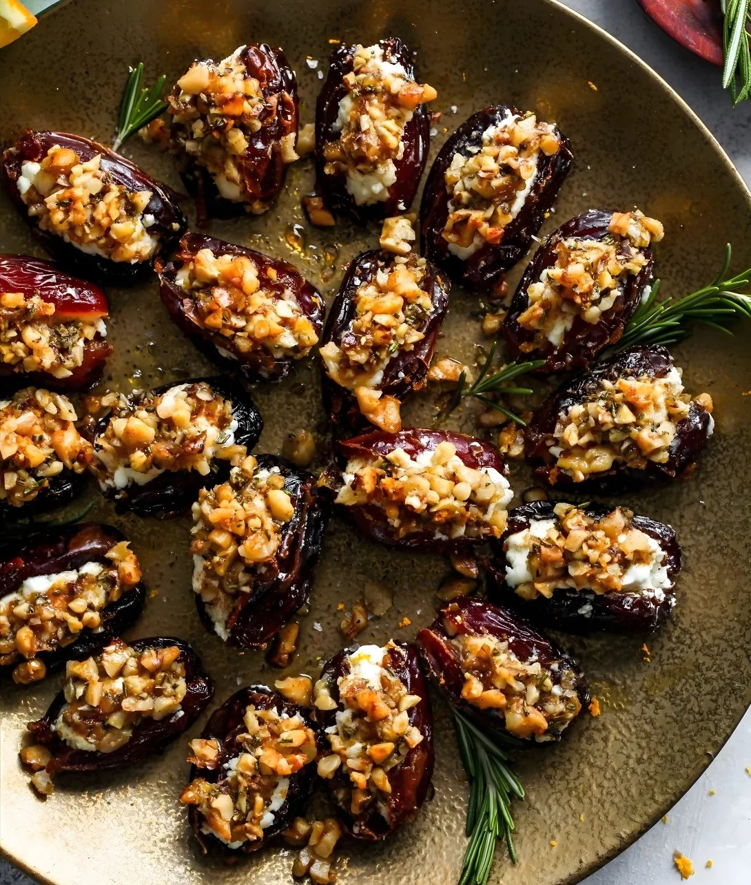 Roasted stuffed dates filled with nuts and spices, a delicious gourmet treat.