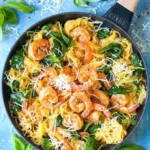 Shrimp scampi served over spaghetti squash garnished with parsley