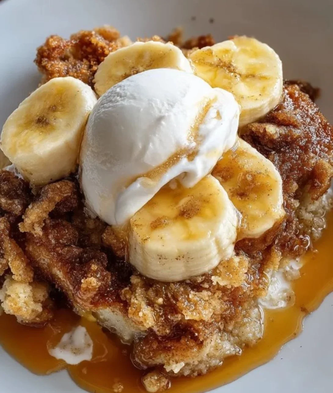 Delicious Southern banana cobbler dessert with a golden crust and ripe bananas
