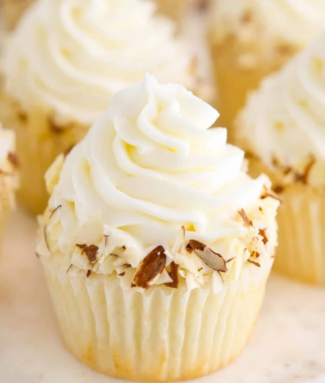 Delicious Almond Amaretto Cupcakes topped with creamy frosting