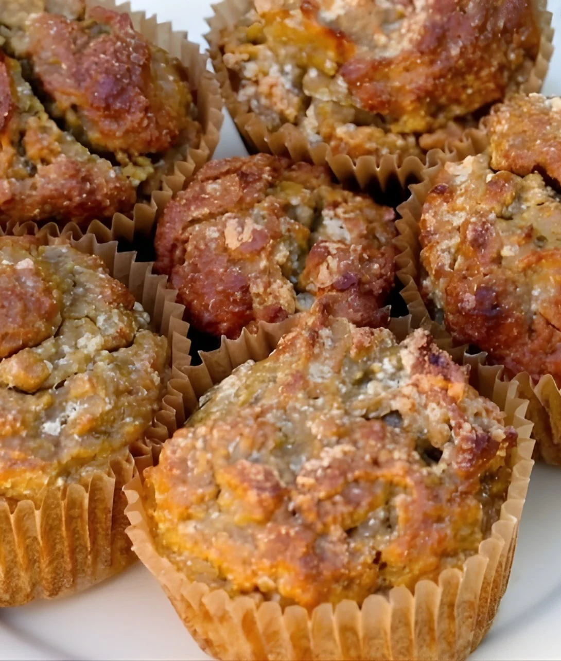 anti-inflammatory coconut and sweet potato muffins on a wooden table