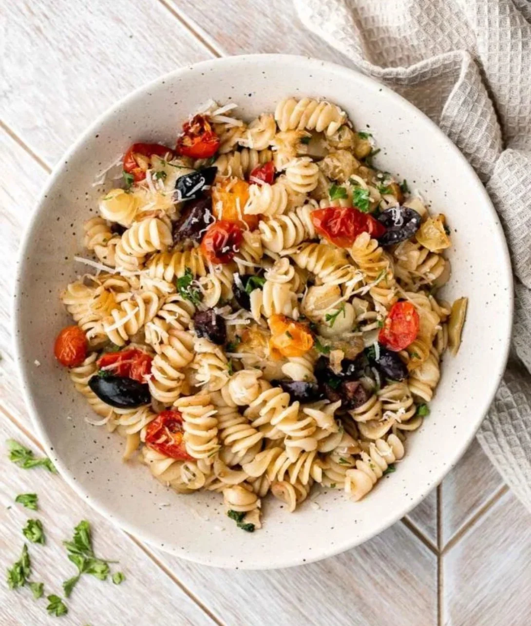 Delicious baked Mediterranean pasta dish with fresh vegetables and herbs