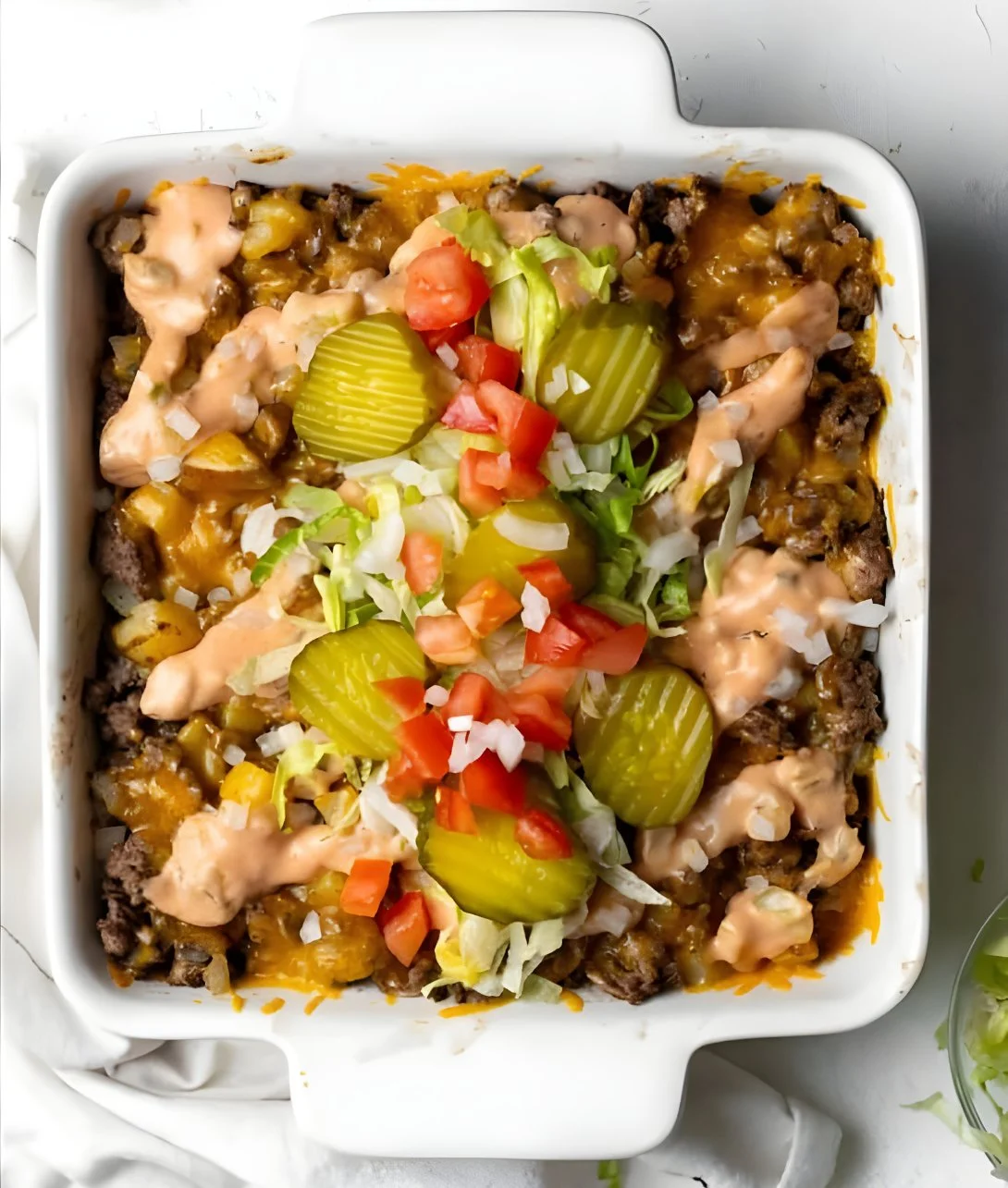 Delicious Big Mac Casserole dish with layers of beef, cheese, and special sauce.