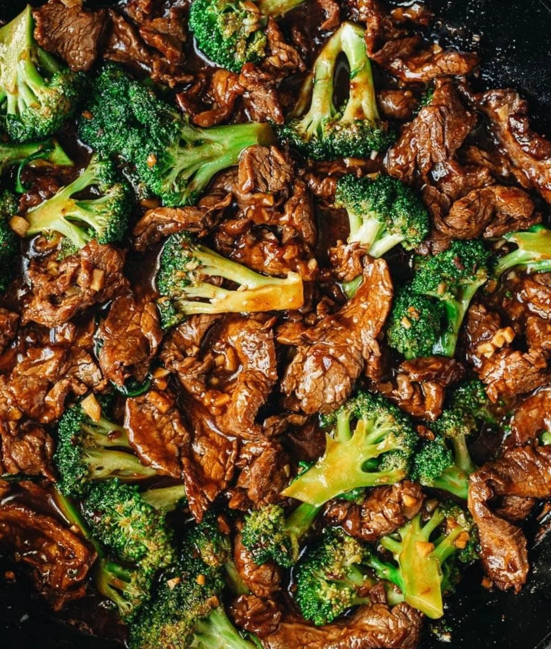 Delicious plate of Chinese Beef and Broccoli served with rice