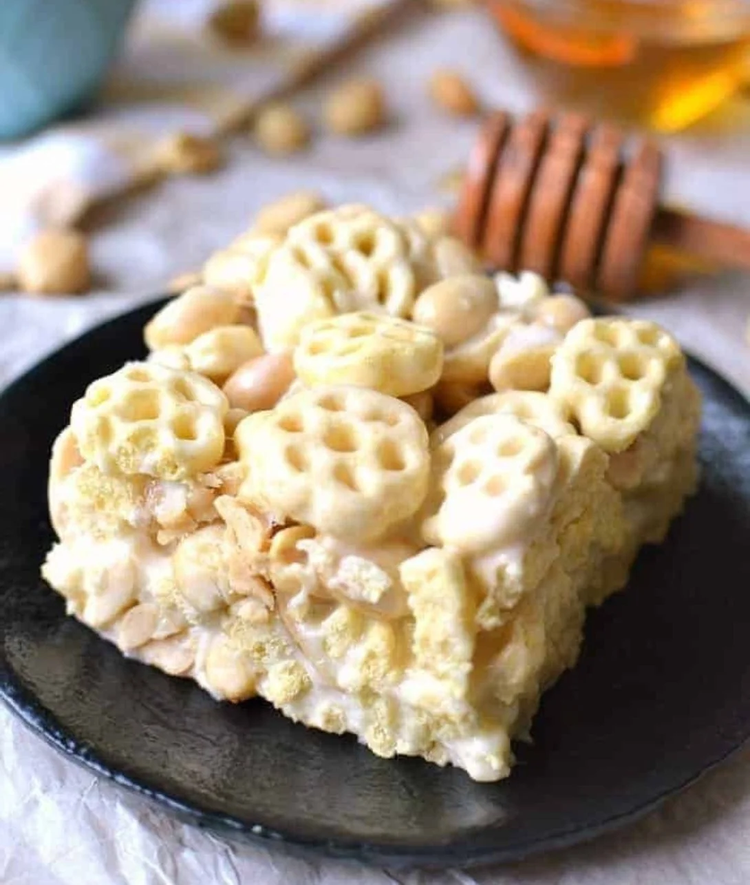 Homemade honeycomb marshmallow treats in a colorful display
