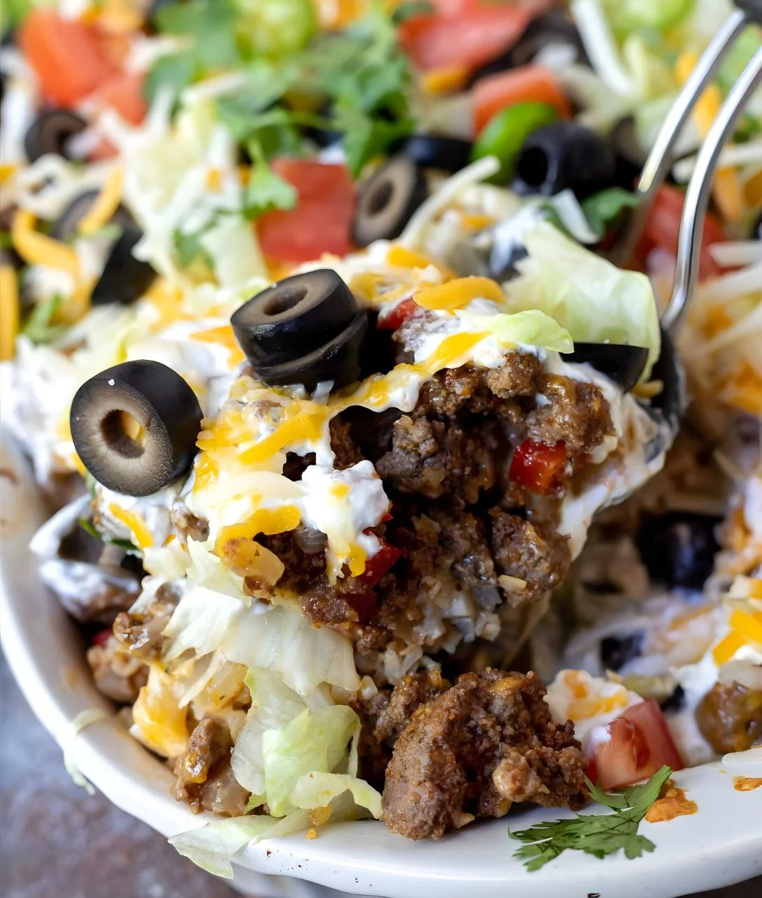 Delicious low carb taco casserole baked with cheese and topping