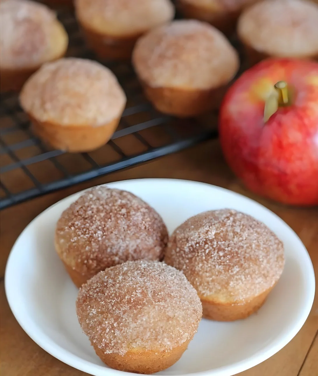 Mini gluten-free vegan apple muffins fresh out of the oven, healthy snack idea.