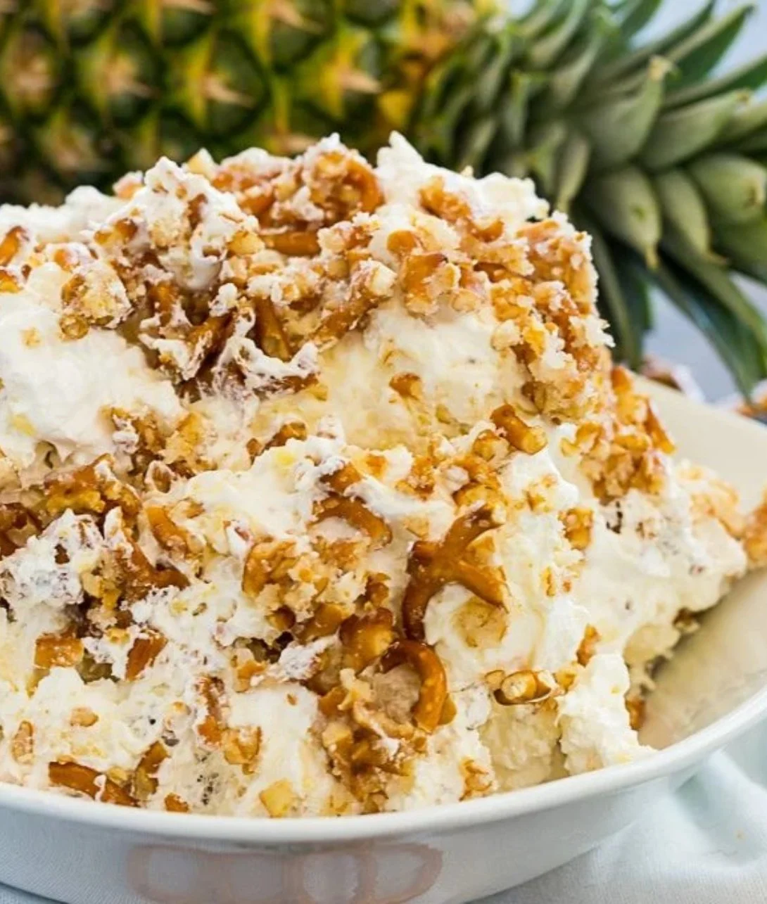 Delicious Pineapple Pretzel Fluff dessert with pineapple and pretzels