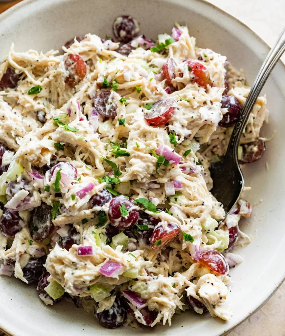 Bowl of Sonoma Chicken Salad with fresh ingredients and vibrant colors