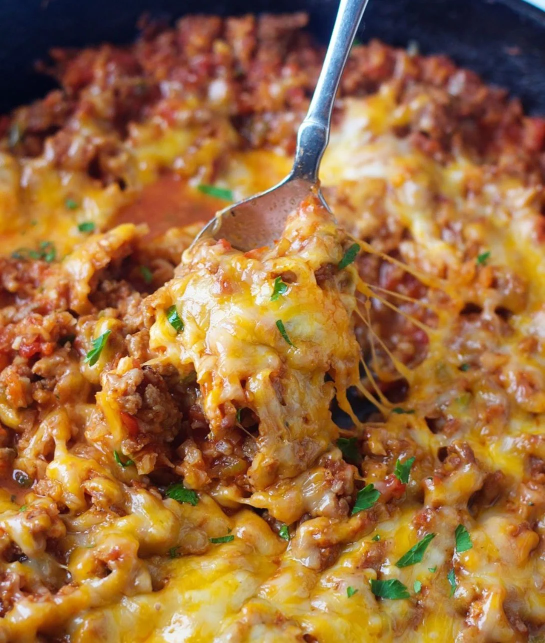 Taco Cauliflower Rice Skillet Dinner with colorful toppings in a skillet