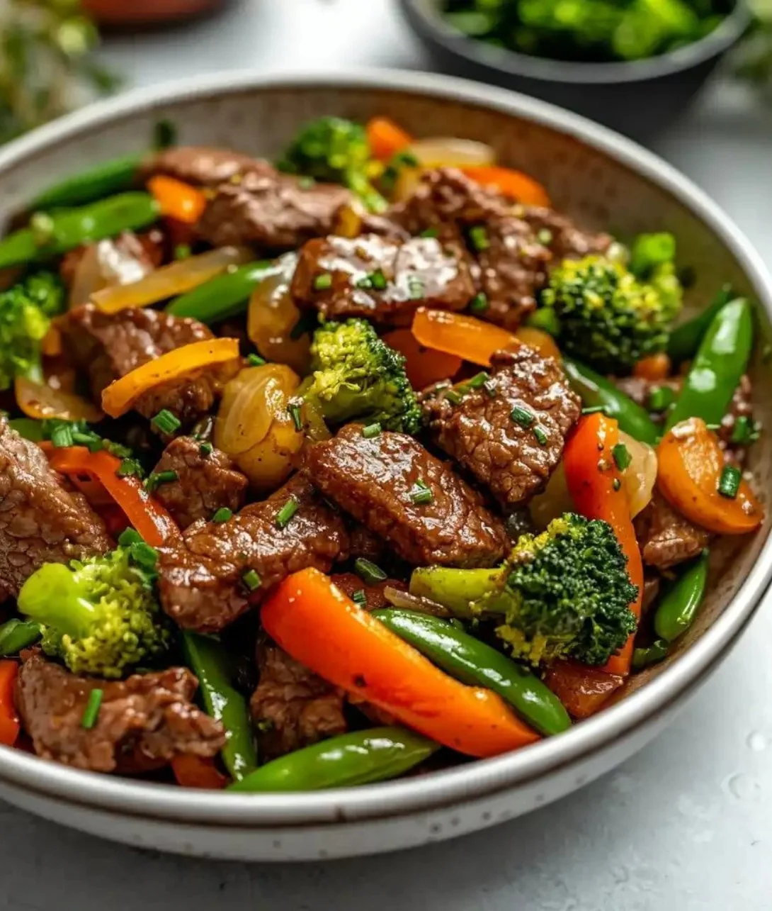 Delicious beef stir fry with colorful vegetables in a skillet