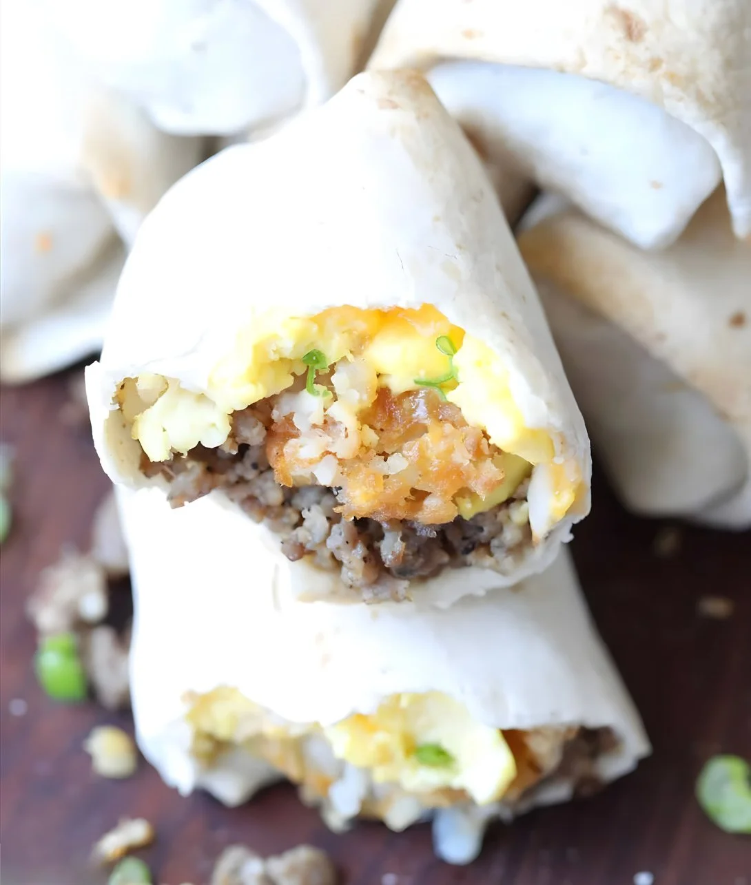 Delicious breakfast burritos with eggs, cheese, and fresh toppings