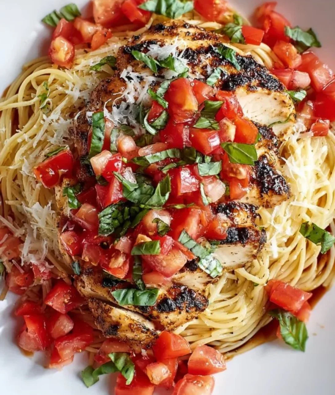 Delicious Bruschetta Chicken Pasta served with fresh ingredients