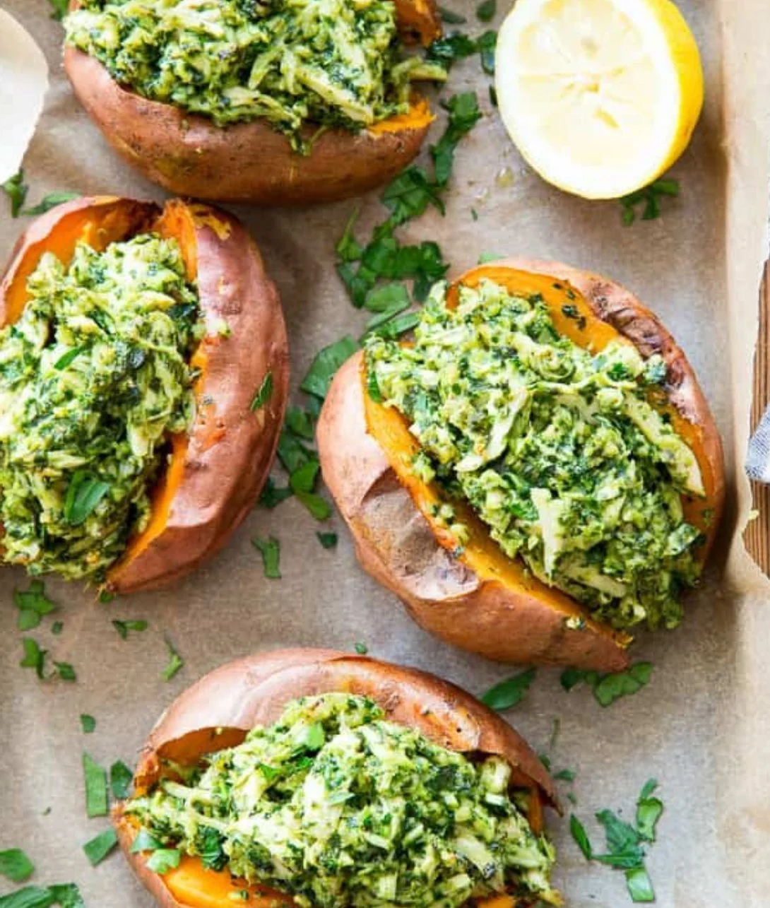Chicken pesto stuffed sweet potatoes with fresh herbs and cheese