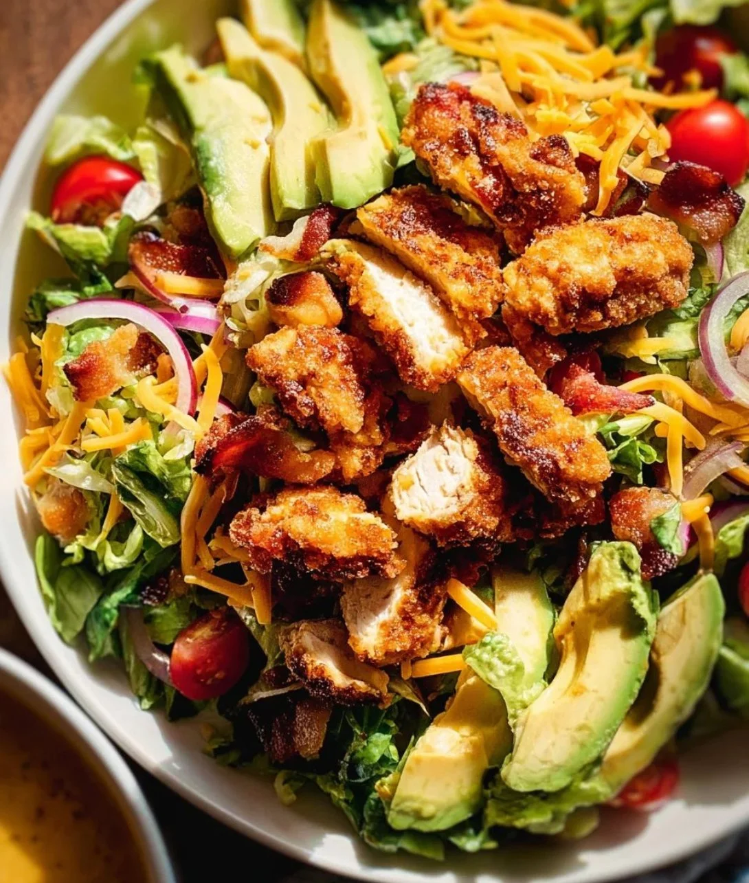 Crispy chicken salad with fresh greens and crunchy toppings