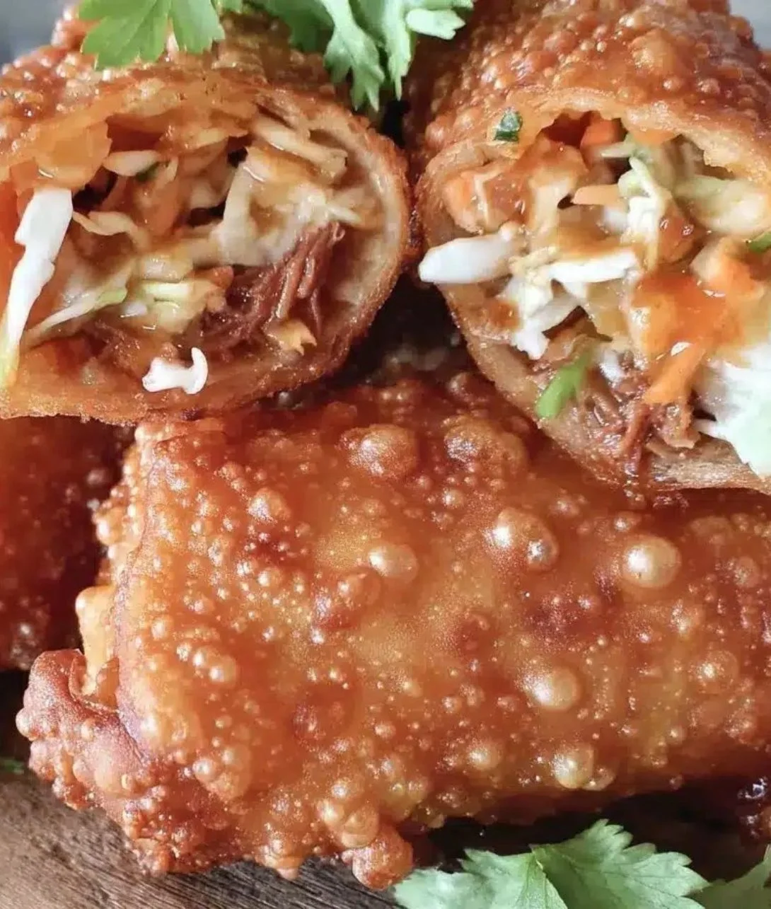 Crispy Irish egg rolls filled with savory ingredients and served with dipping sauce.