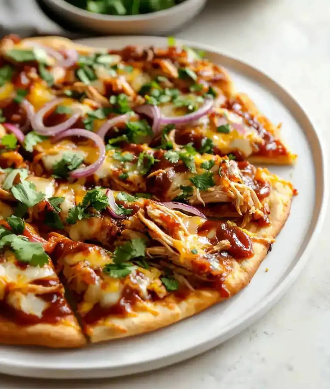 Delicious easy BBQ chicken flatbread topped with fresh ingredients