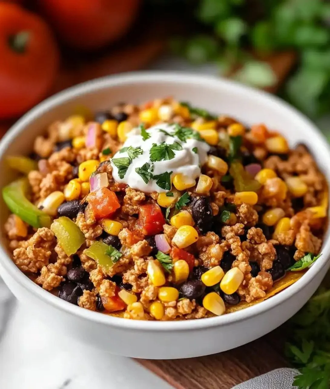 Easy ground turkey taco skillet dish served with toppings