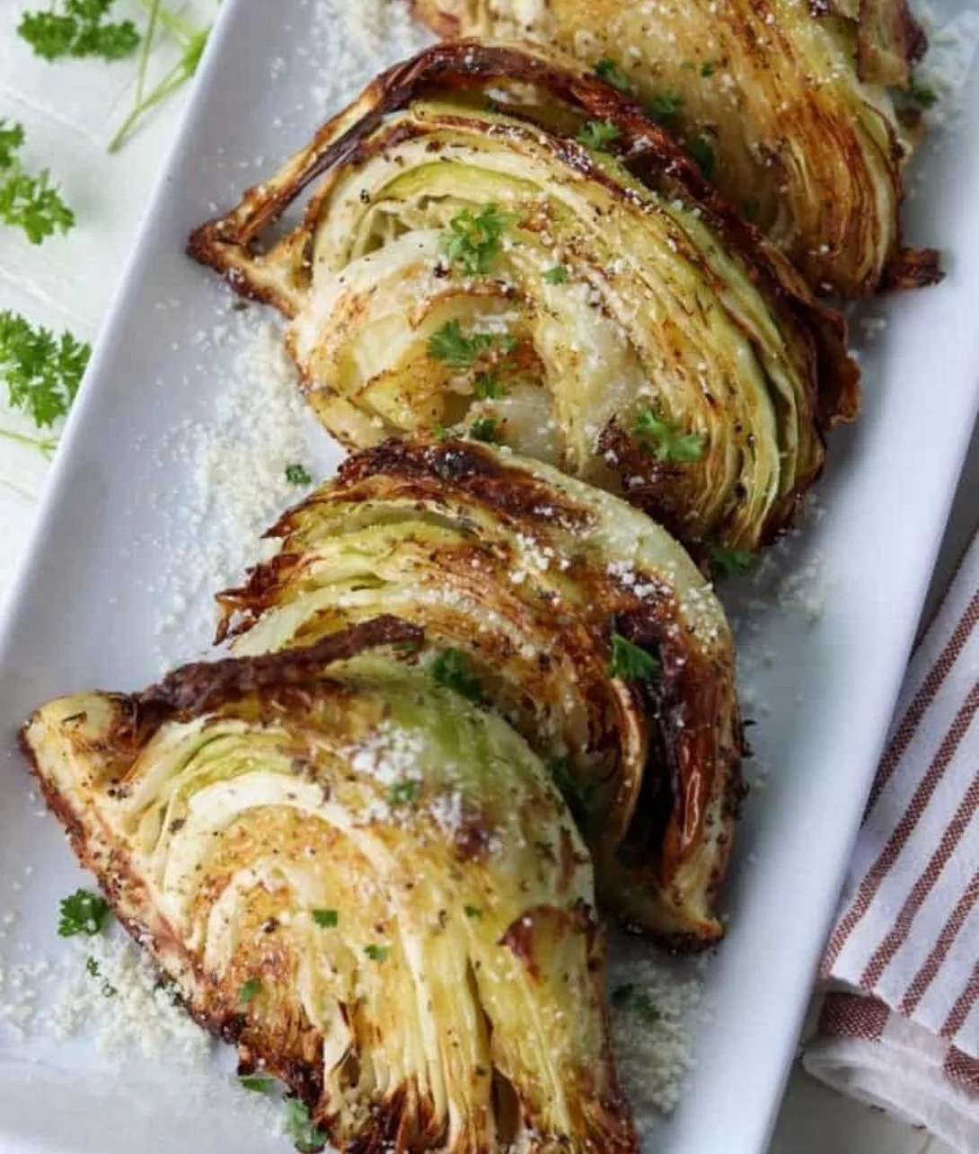 Easy healthy air fryer cabbage recipe served on a plate with seasonings