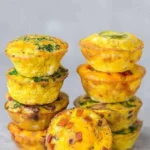 Homemade egg muffins with vegetables and cheese, perfect for breakfast.