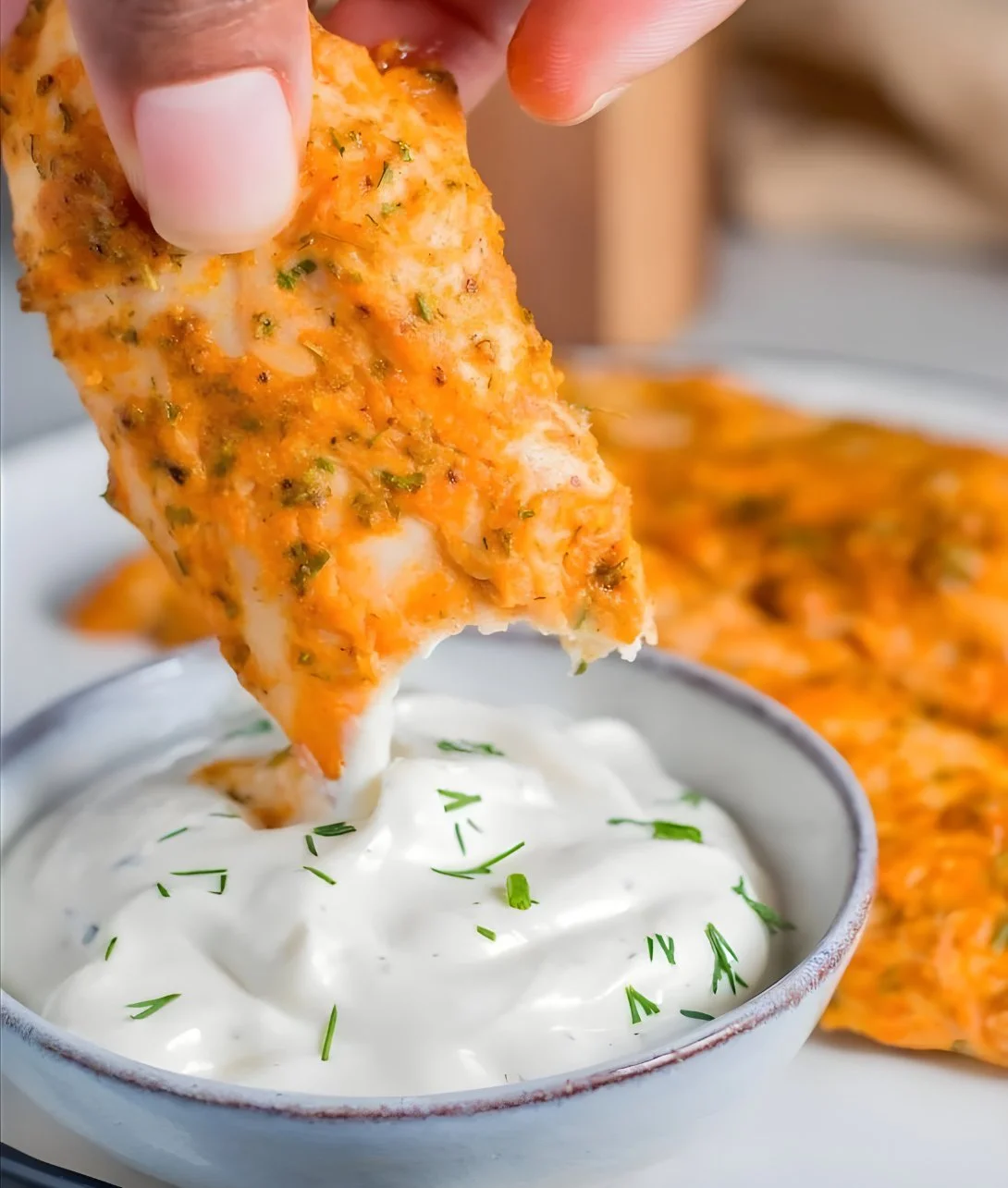Healthy Buffalo Ranch Baked Chicken Strips served on a plate