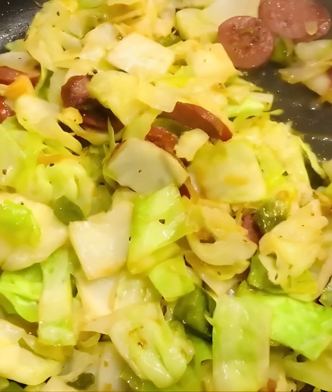 Keto Fried Sausage with Cabbage served in a dish