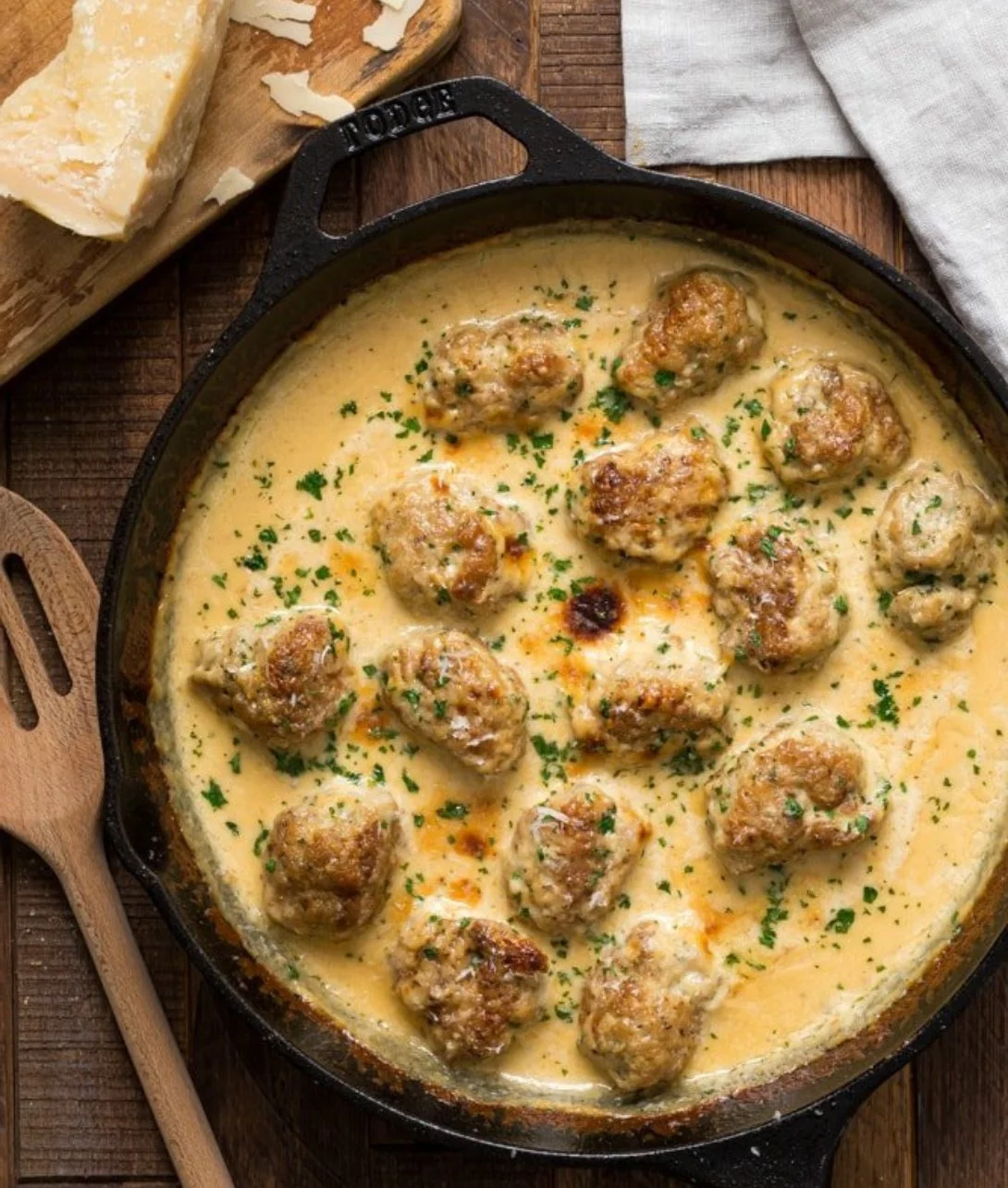 Keto Turkey Meatballs served with a parsley garnish on a plate