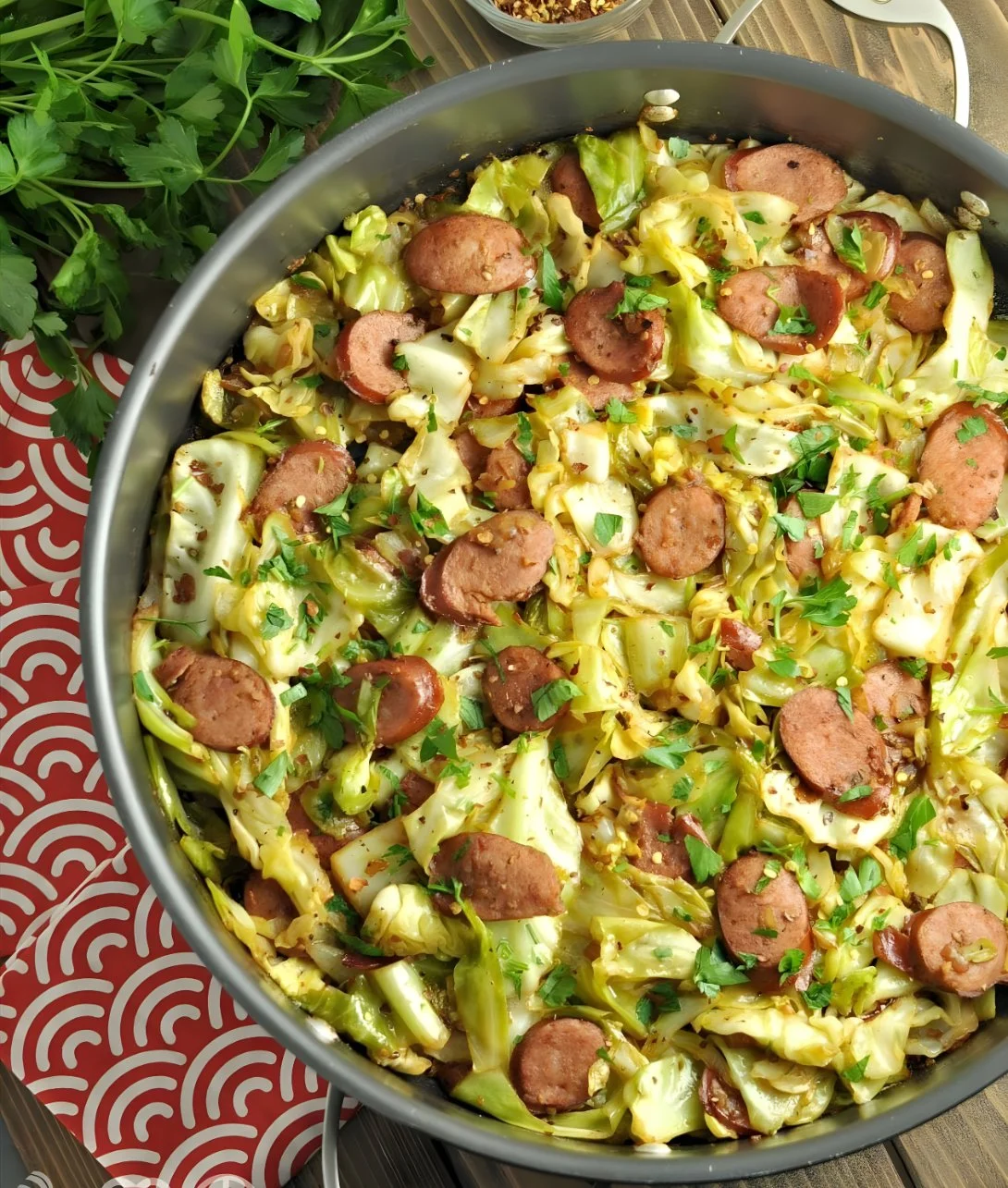 Low carb fried cabbage with kielbasa in a skillet