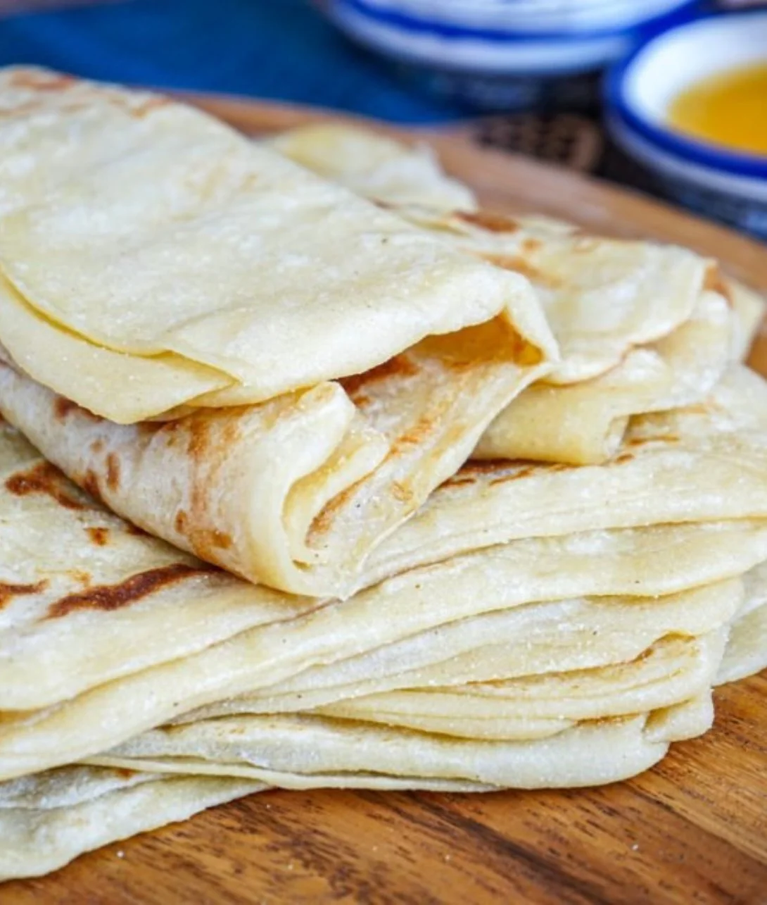 Delicious Moroccan Msemen square flatbread served on a plate.