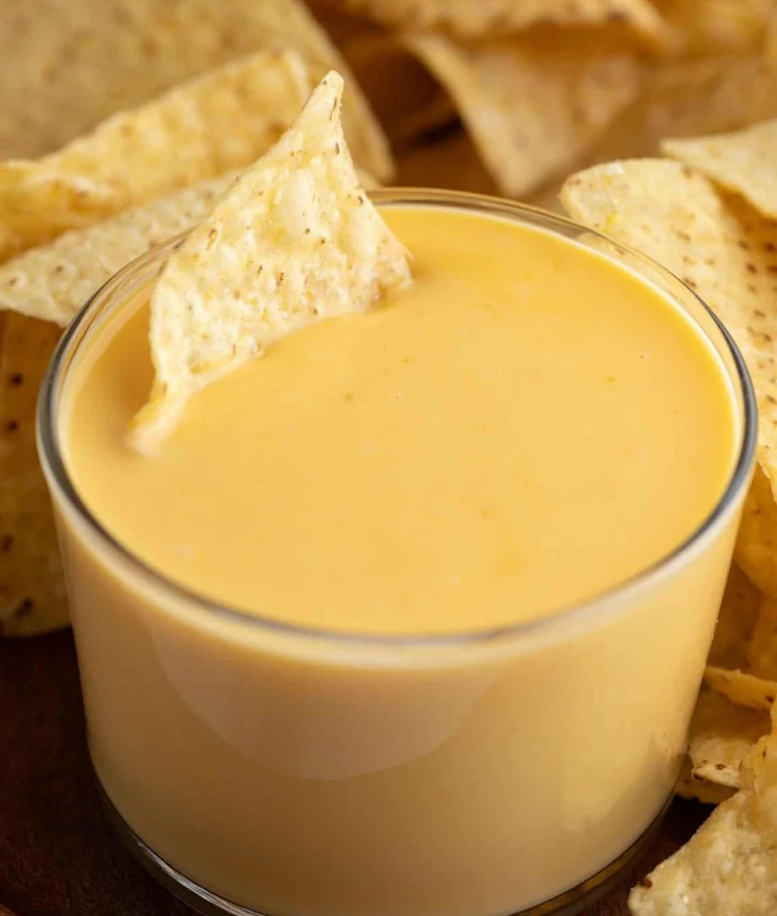 Delicious Taco Bell nacho cheese drizzled over nachos and tacos