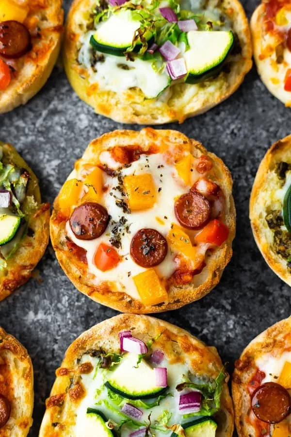 Homemade English muffin pizza topped with cheese and pepperoni
