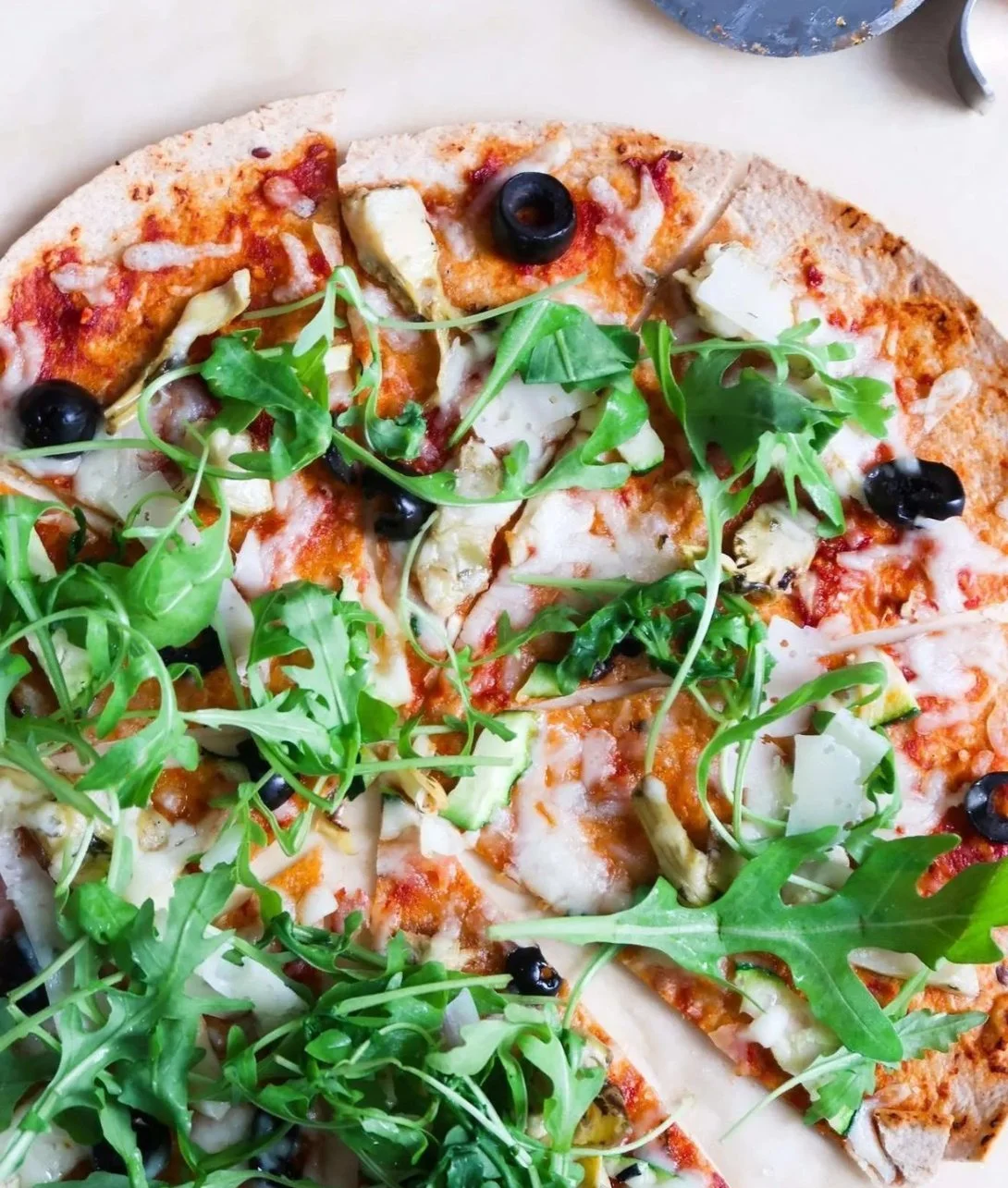 Quick and delicious 10-minute vegetarian tortilla pizza ready to serve.