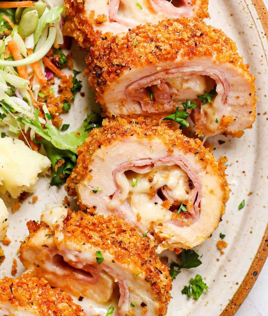 Baked Chicken Cordon Bleu with crispy chicken, ham, and melted cheese