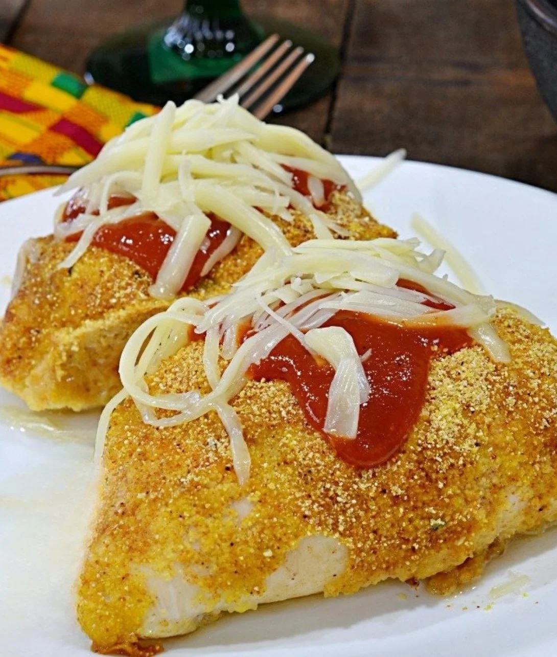 Baked chicken stuffed peppers filled with seasoned chicken and colorful vegetables.
