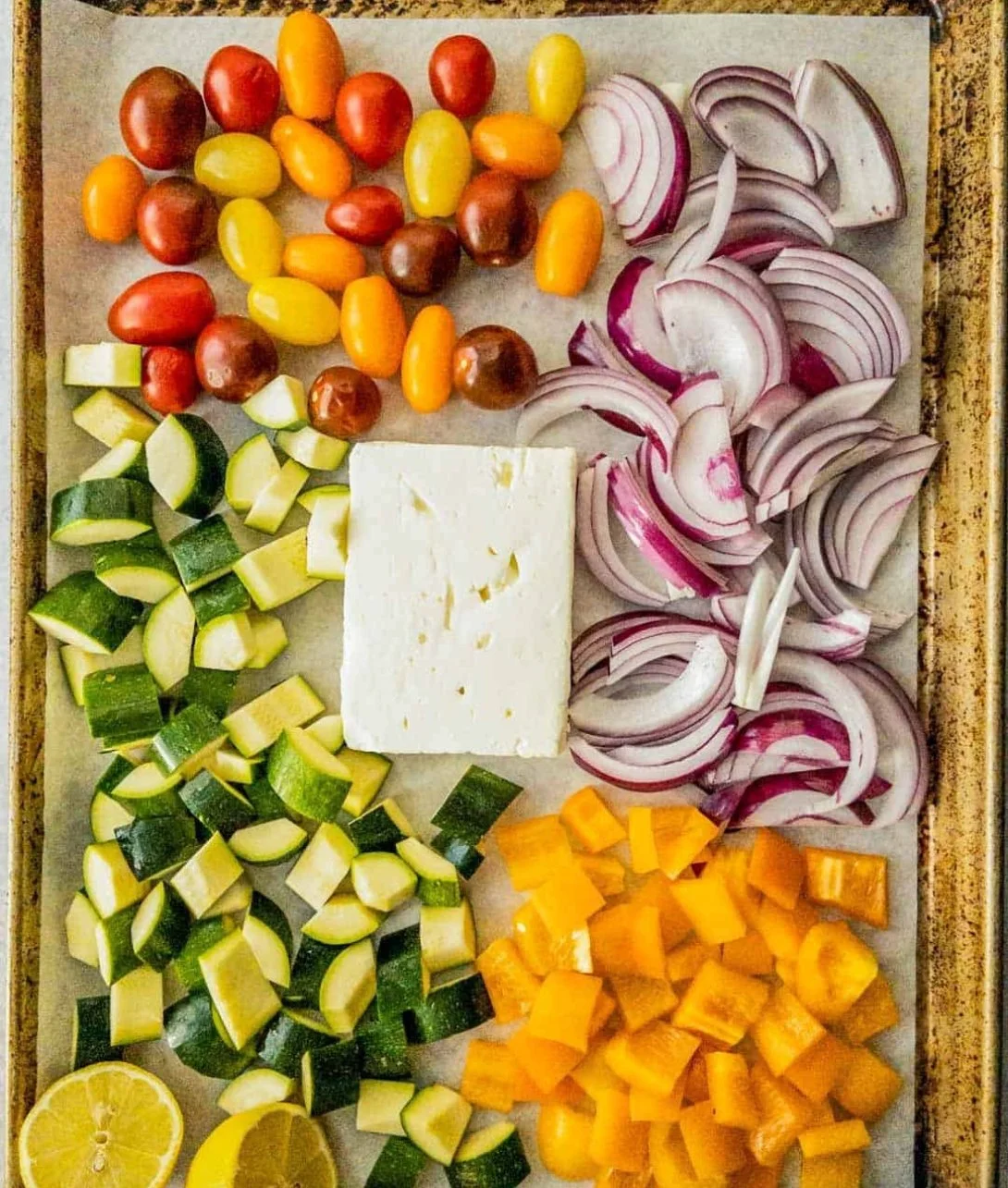 Baked Feta Pasta with Vegetables, a colorful and tasty dish made with roasted feta and fresh veggies.