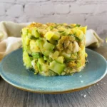 Baked zucchini, spinach, and feta casserole in a dish