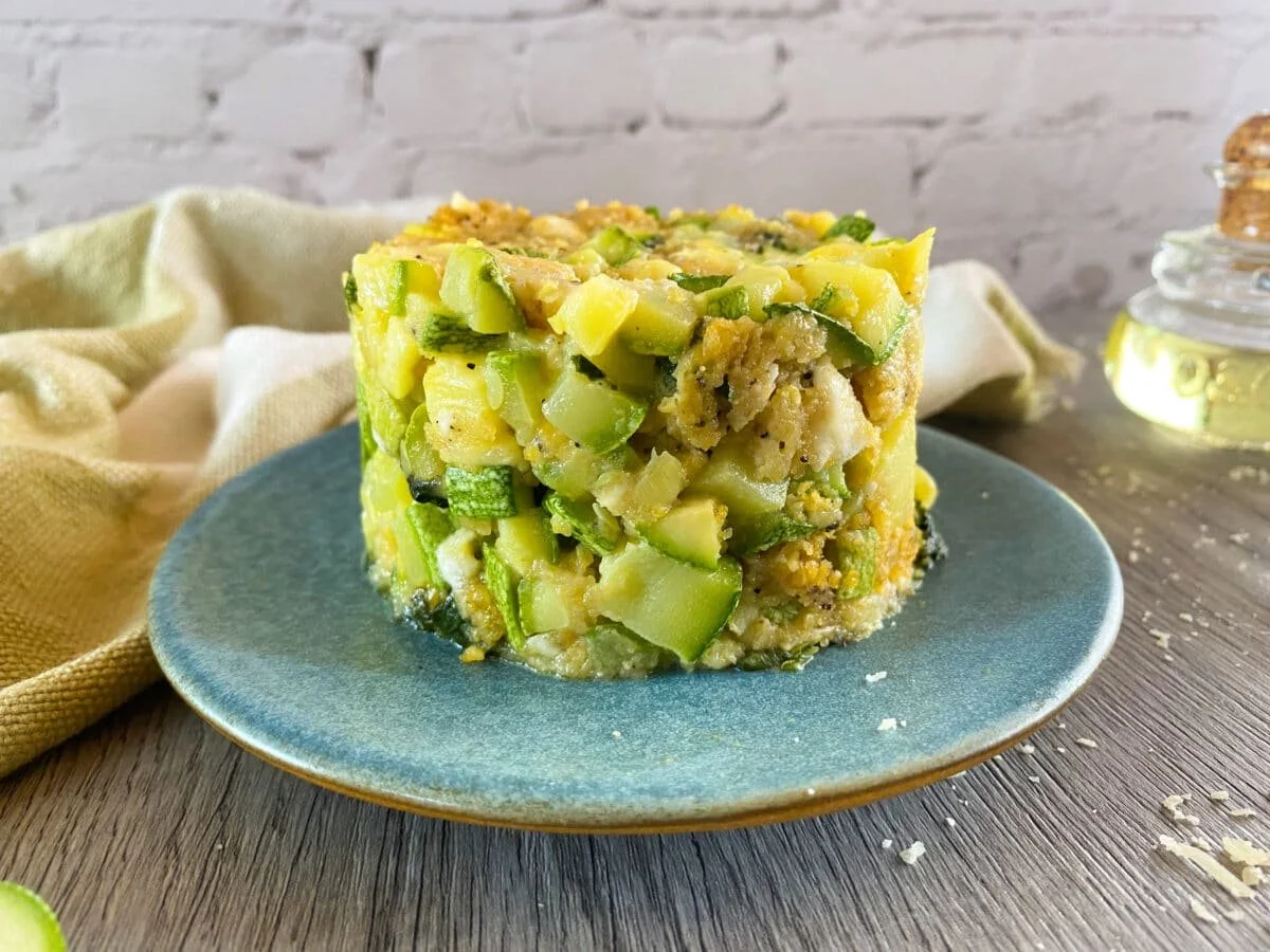 Baked zucchini, spinach, and feta casserole in a dish