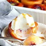 Cinnamon sugar baked peaches served warm with a sprinkle of cinnamon on top