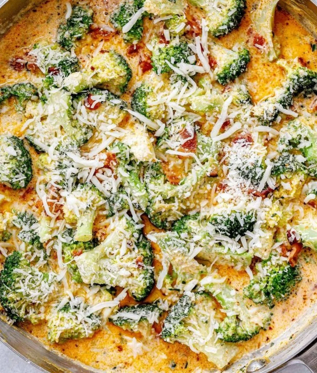 Creamy garlic parmesan broccoli with bacon in a serving bowl
