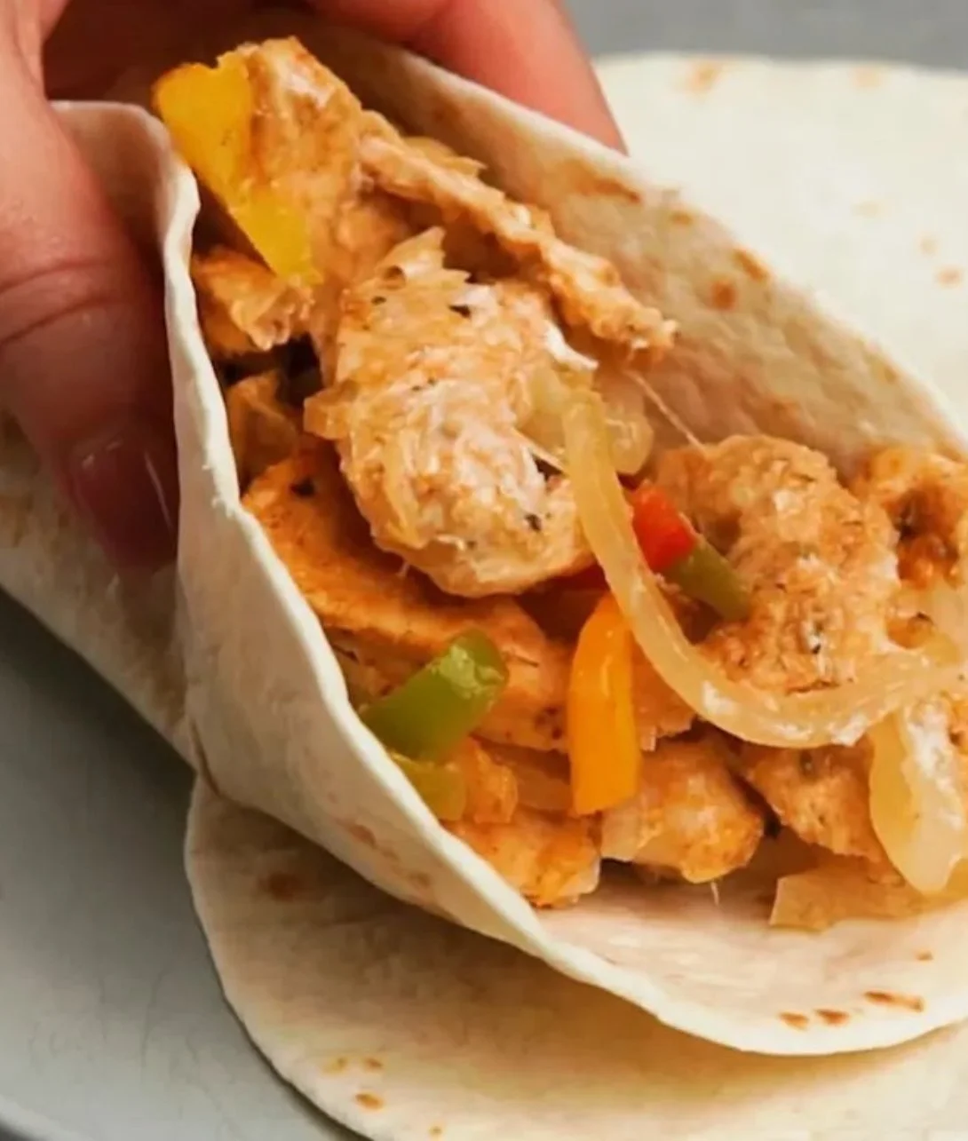 Sheet pan chicken fajitas with colorful bell peppers and onions
