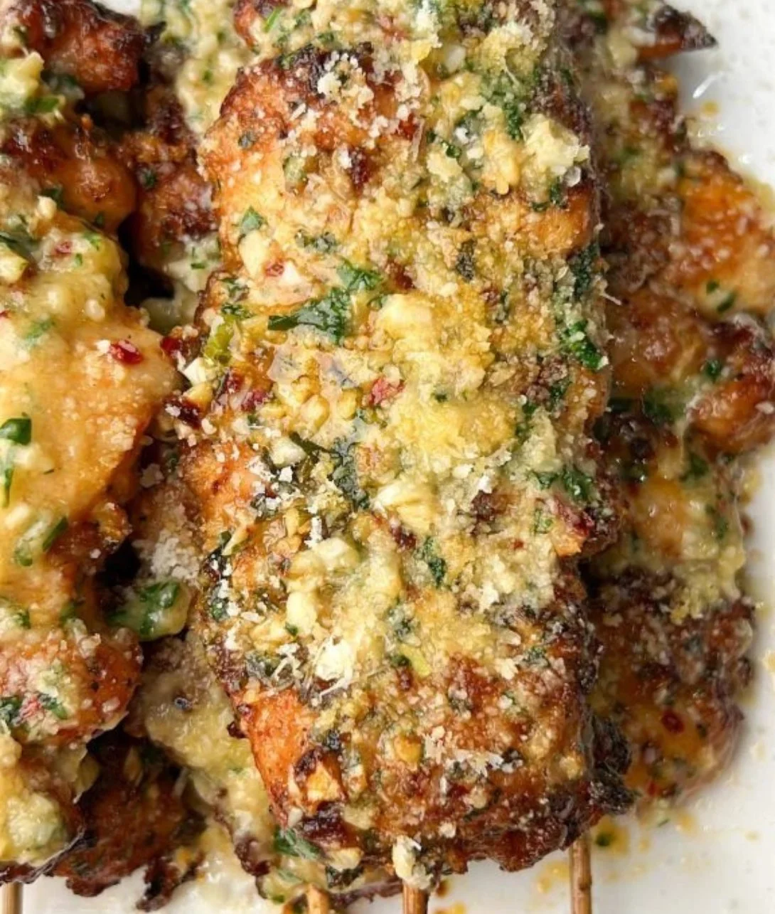 Garlic Parmesan Chicken Skewers on a serving plate