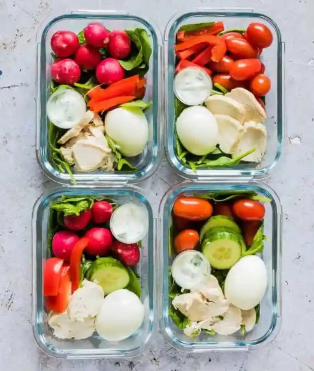 Healthy chicken meal prep bowls with vegetables and grains for easy meal planning