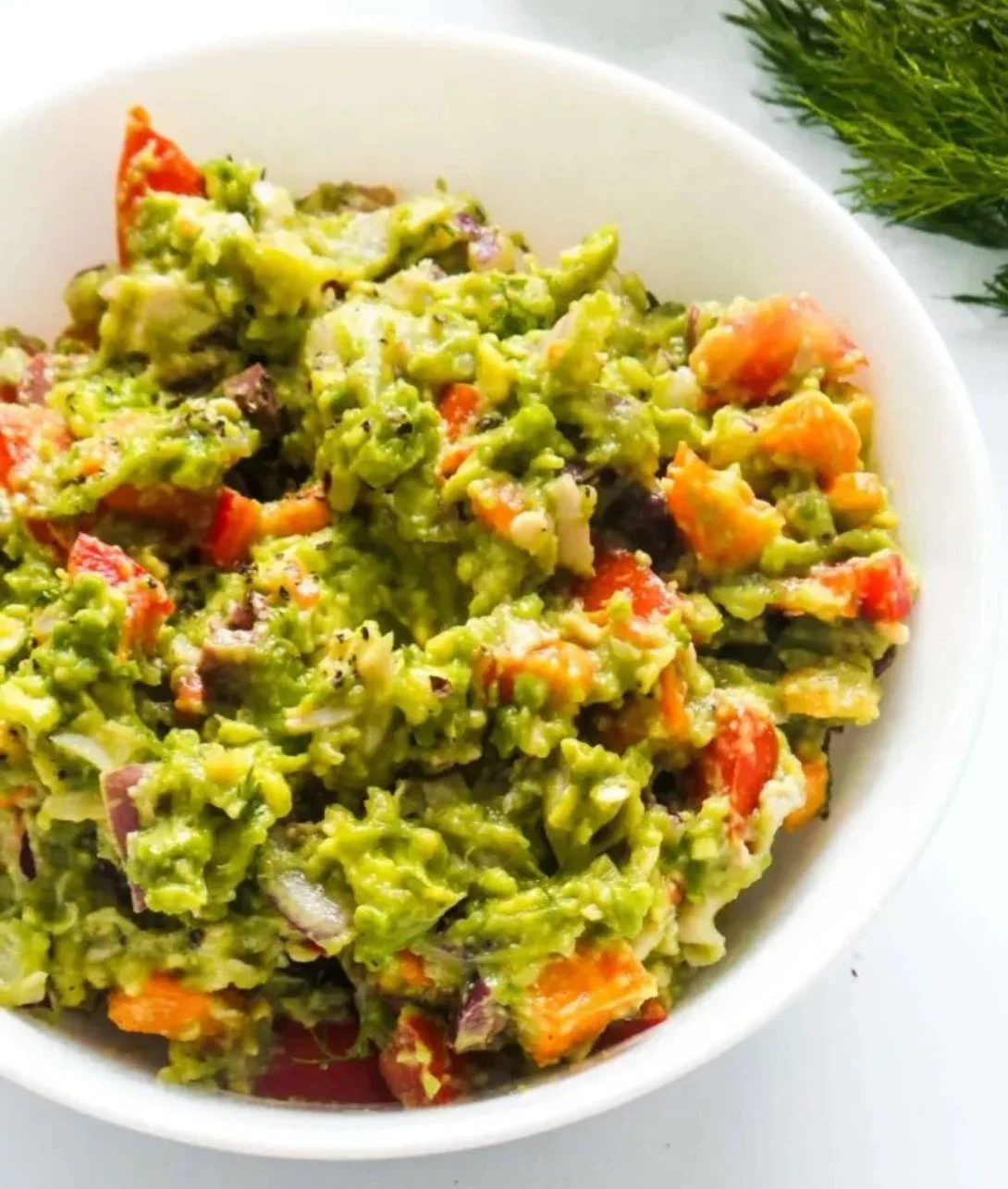Healthy chicken salad with avocado on a plate