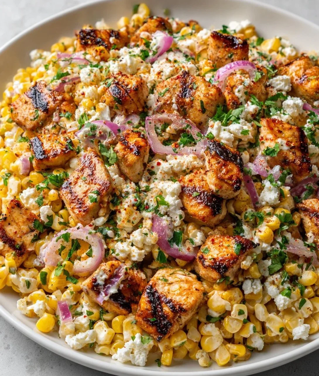 High Protein Chicken Salad with street corn and vibrant ingredients