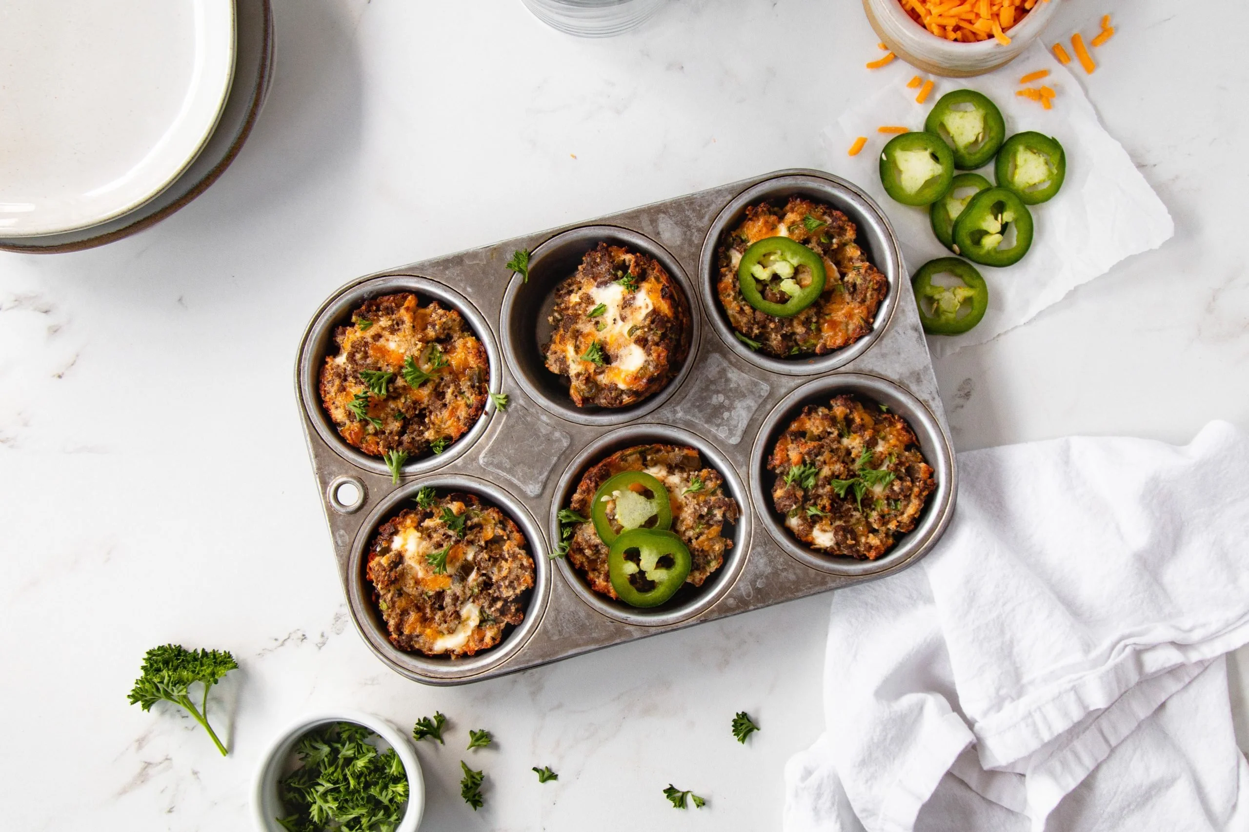 High protein jalapeño popper cheeseburger bites on a plate
