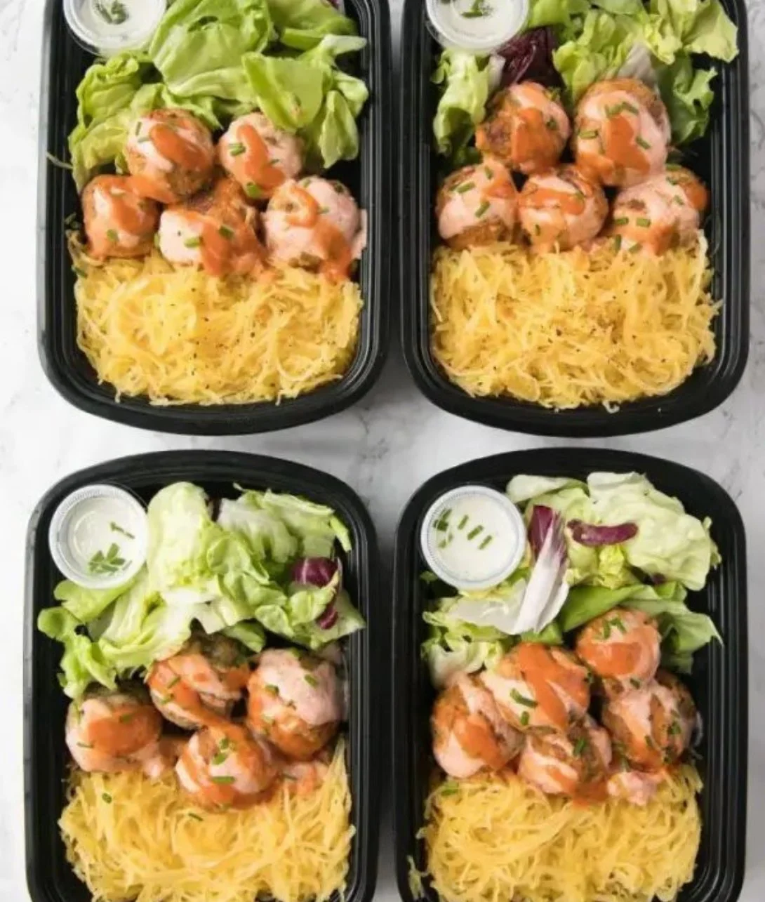 Plate of high protein turkey meal with vegetables and grains