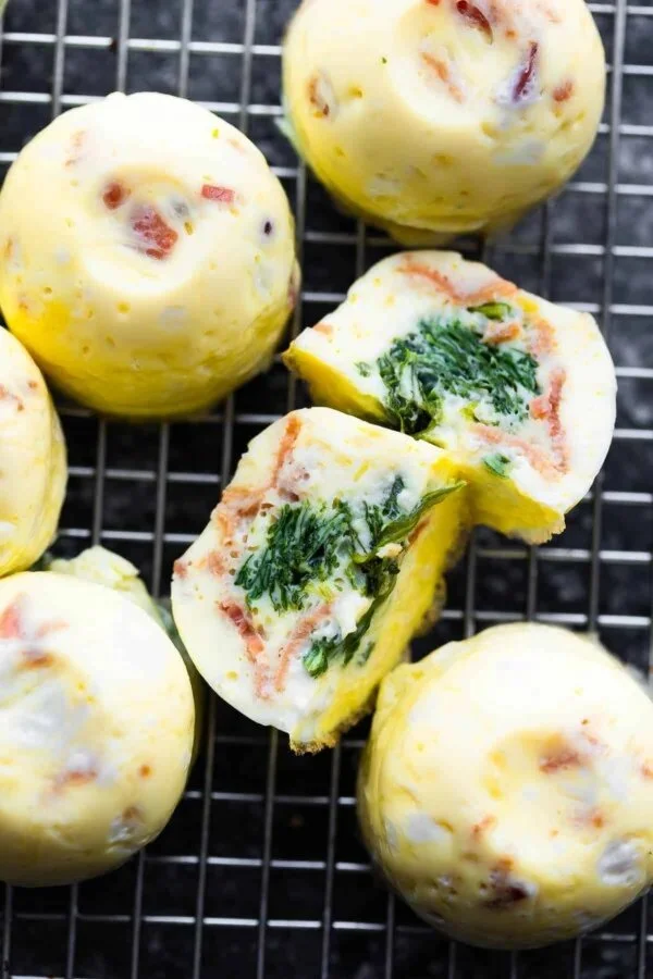 Instant Pot egg bites served in a bowl, showcasing their fluffy texture and vibrant ingredients.