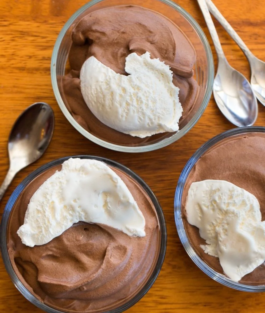 Delicious Keto Chocolate Mousse topped with whipped cream and chocolate shavings